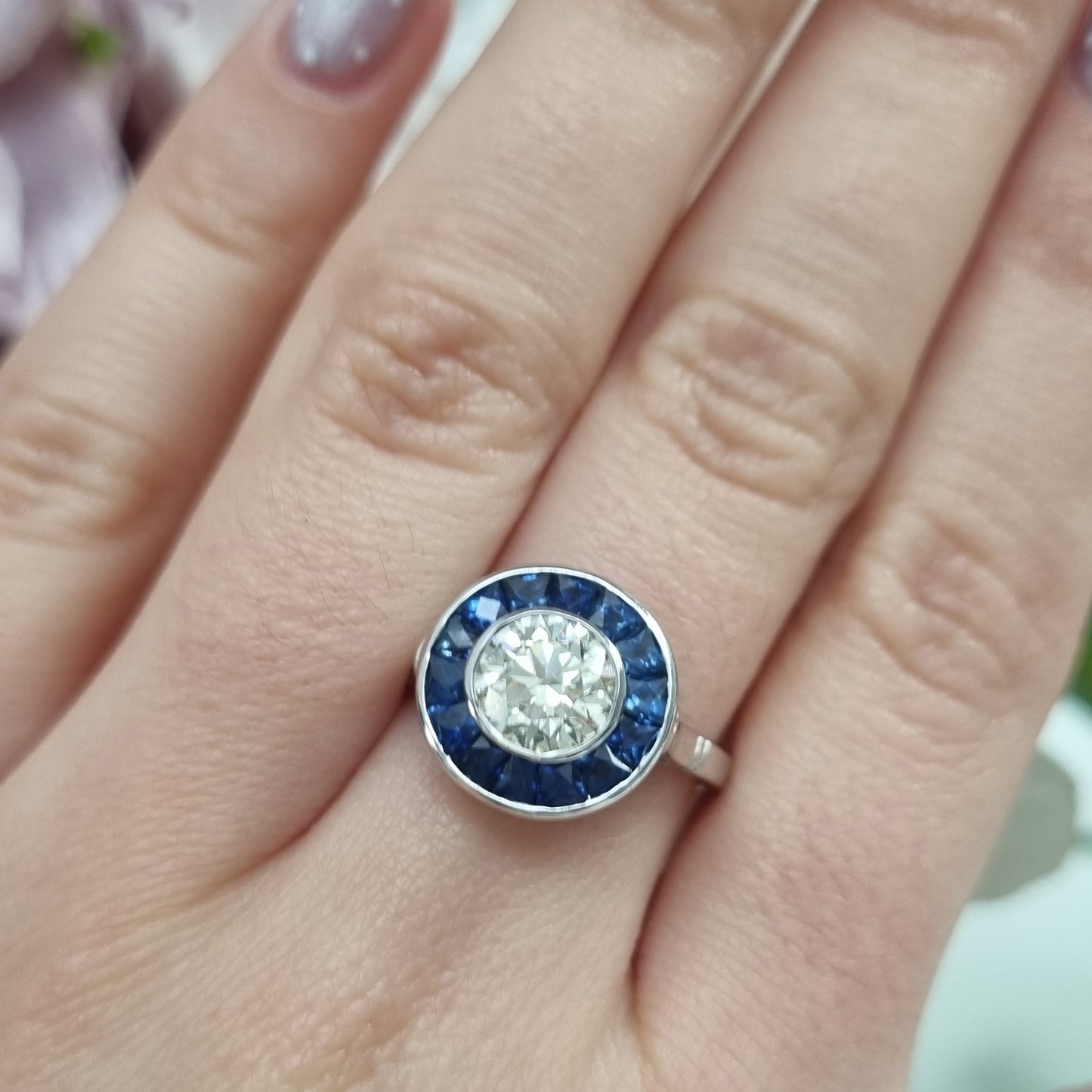 1.21ct Diamond and Calibre Sapphire Target Engagement Ring