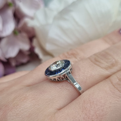 1.21ct Diamond and Calibre Sapphire Target Engagement Ring