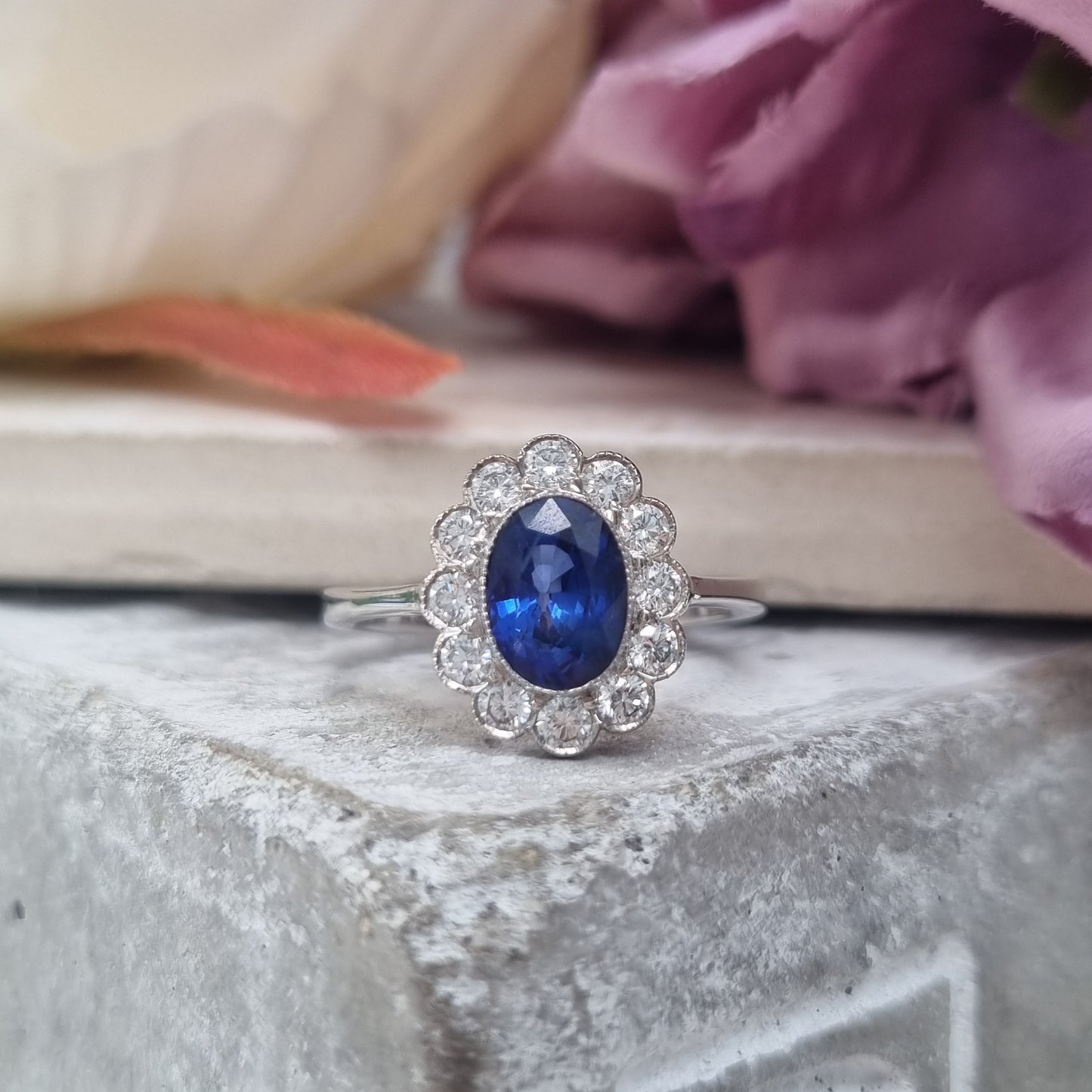 1.33ct Oval Sapphire and Diamond Cluster Engagement Ring