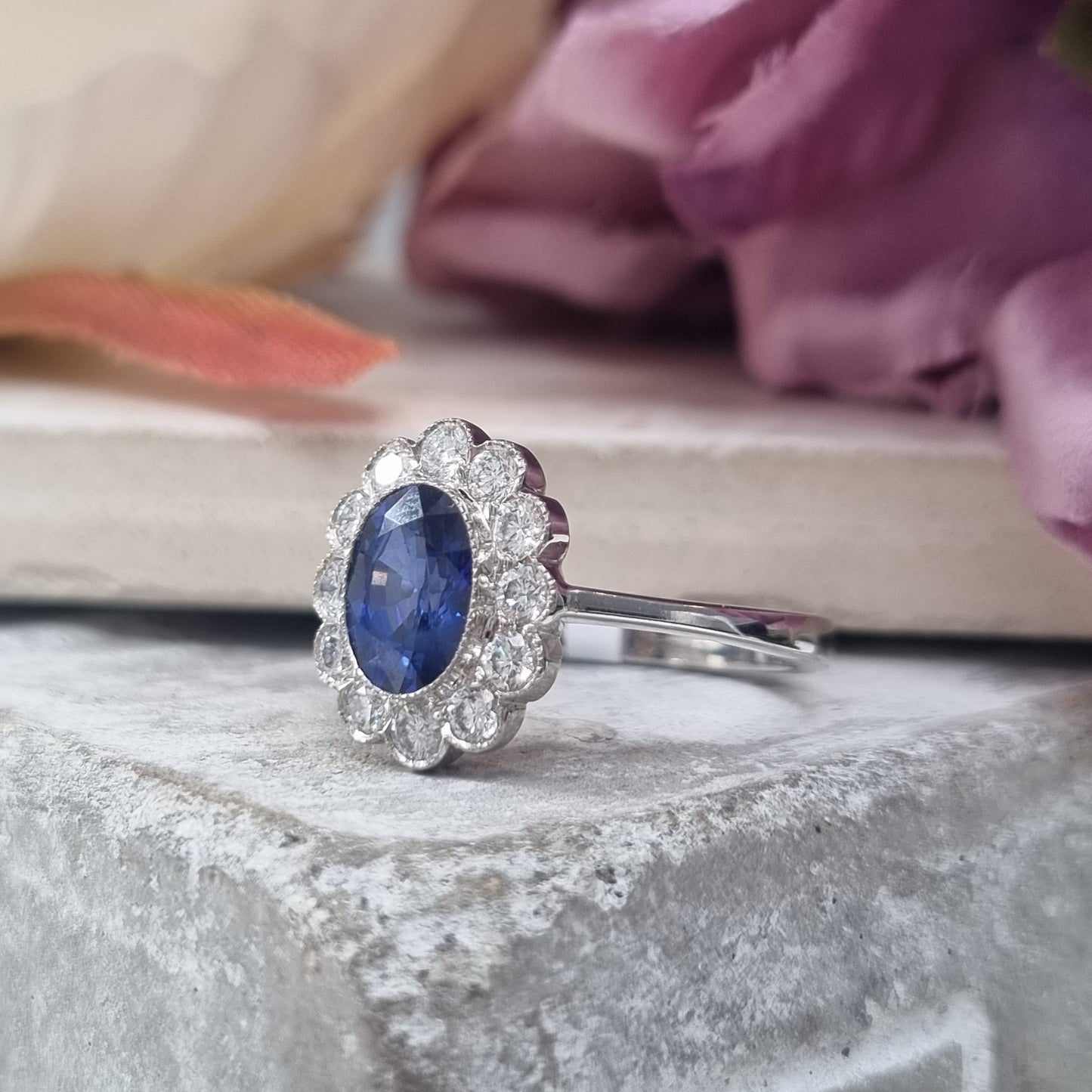 1.33ct Oval Sapphire and Diamond Cluster Engagement Ring