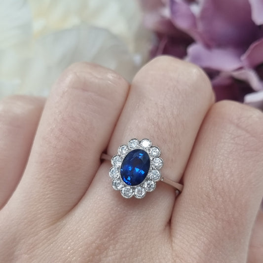 1.33ct Oval Sapphire and Diamond Cluster Engagement Ring