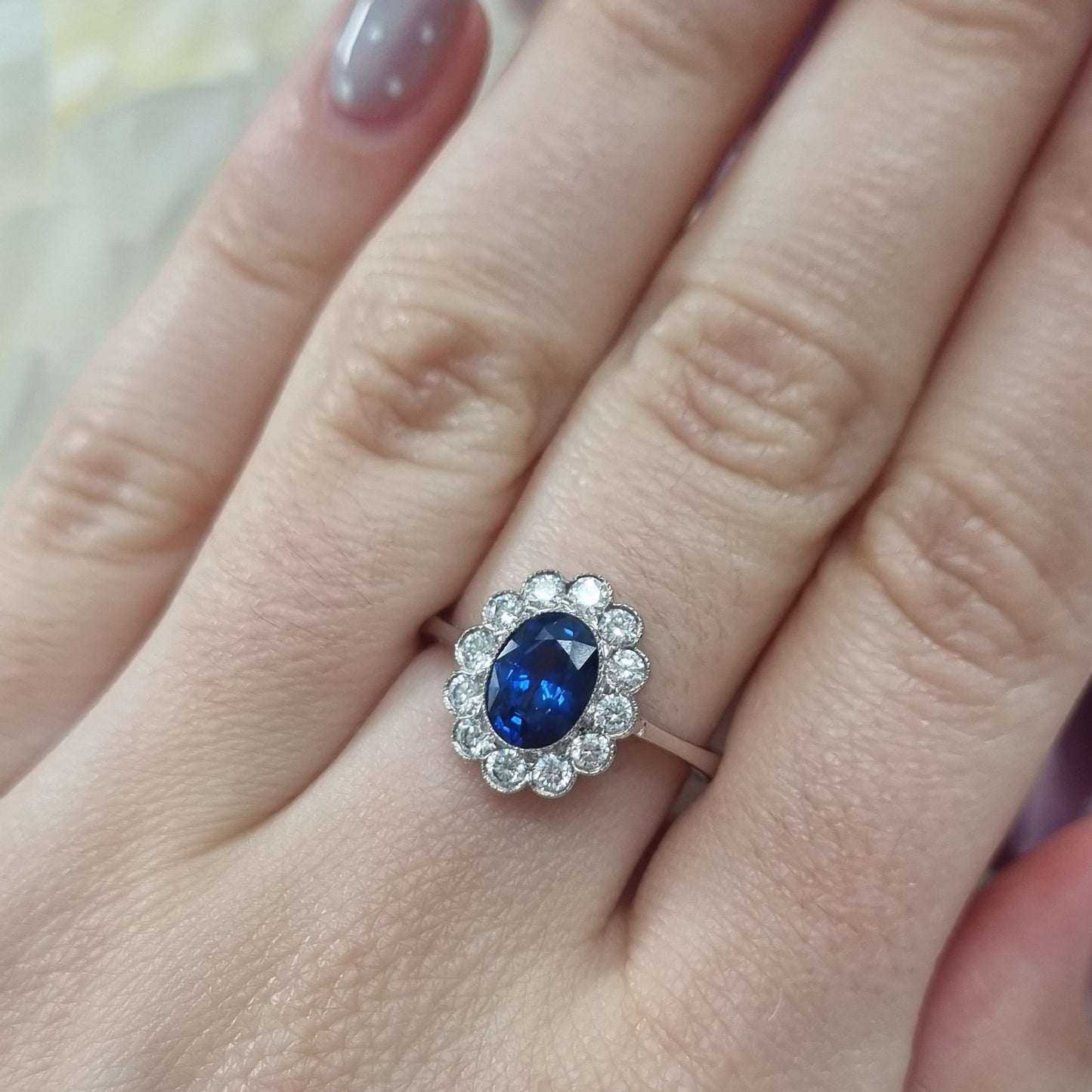 1.33ct Oval Sapphire and Diamond Cluster Engagement Ring