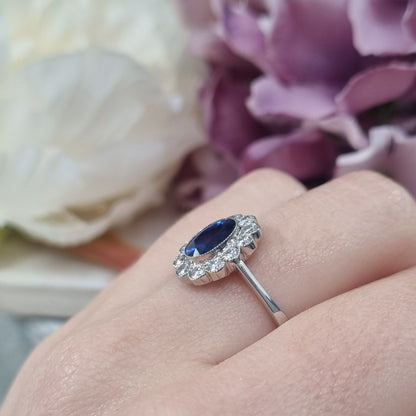 1.33ct Oval Sapphire and Diamond Cluster Engagement Ring