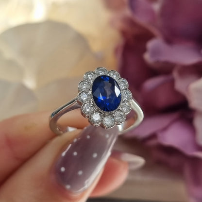 1.33ct Oval Sapphire and Diamond Cluster Engagement Ring