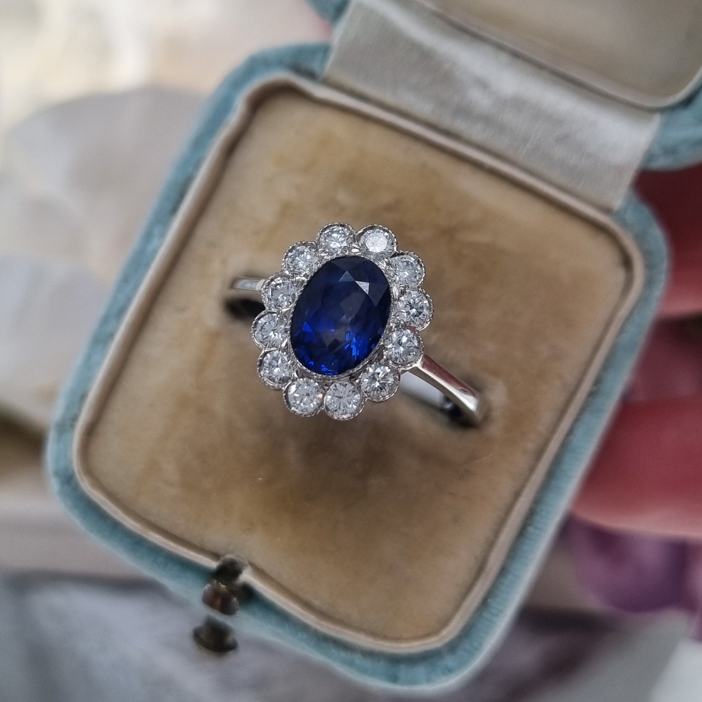 1.33ct Oval Sapphire and Diamond Cluster Engagement Ring