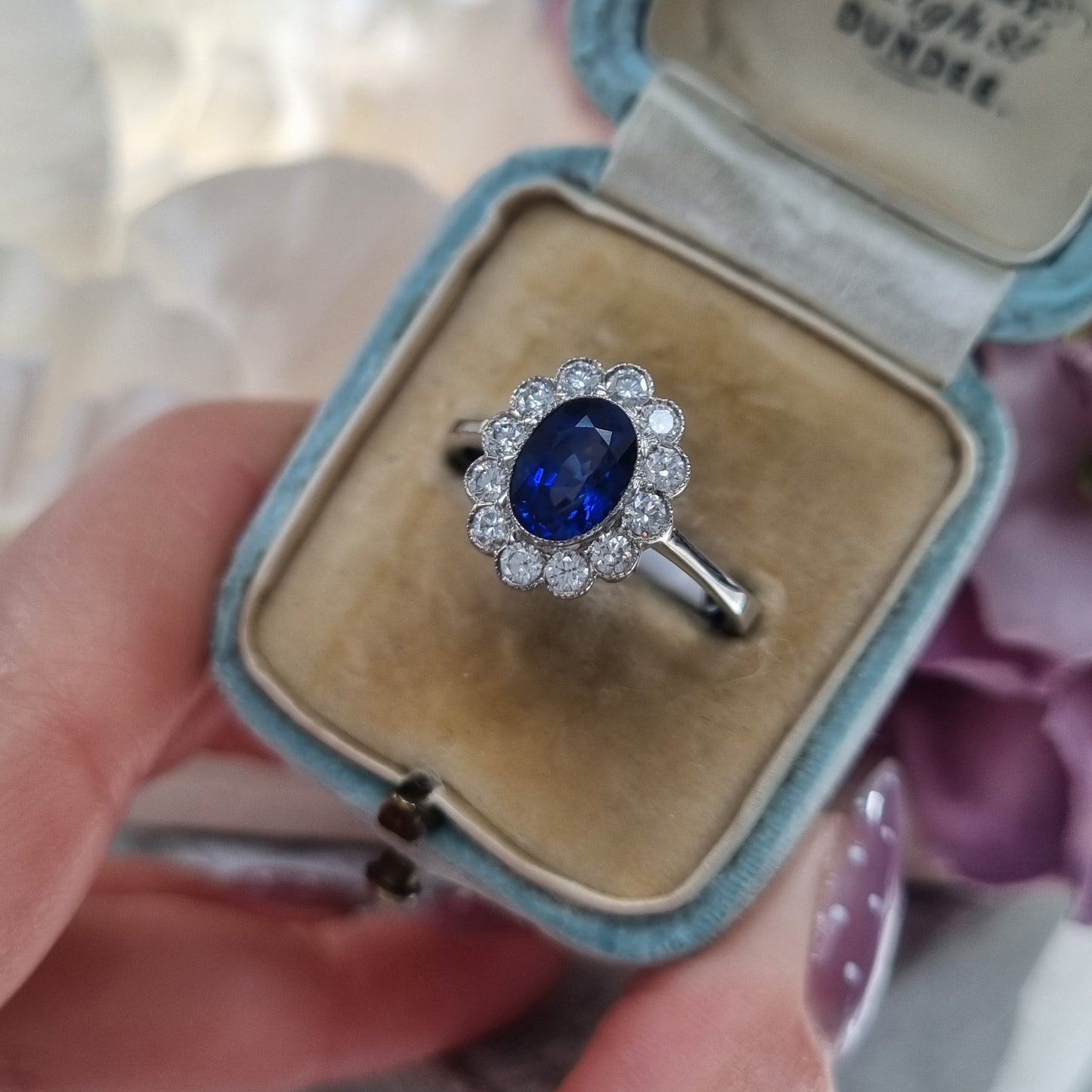 1.33ct Oval Sapphire and Diamond Cluster Engagement Ring