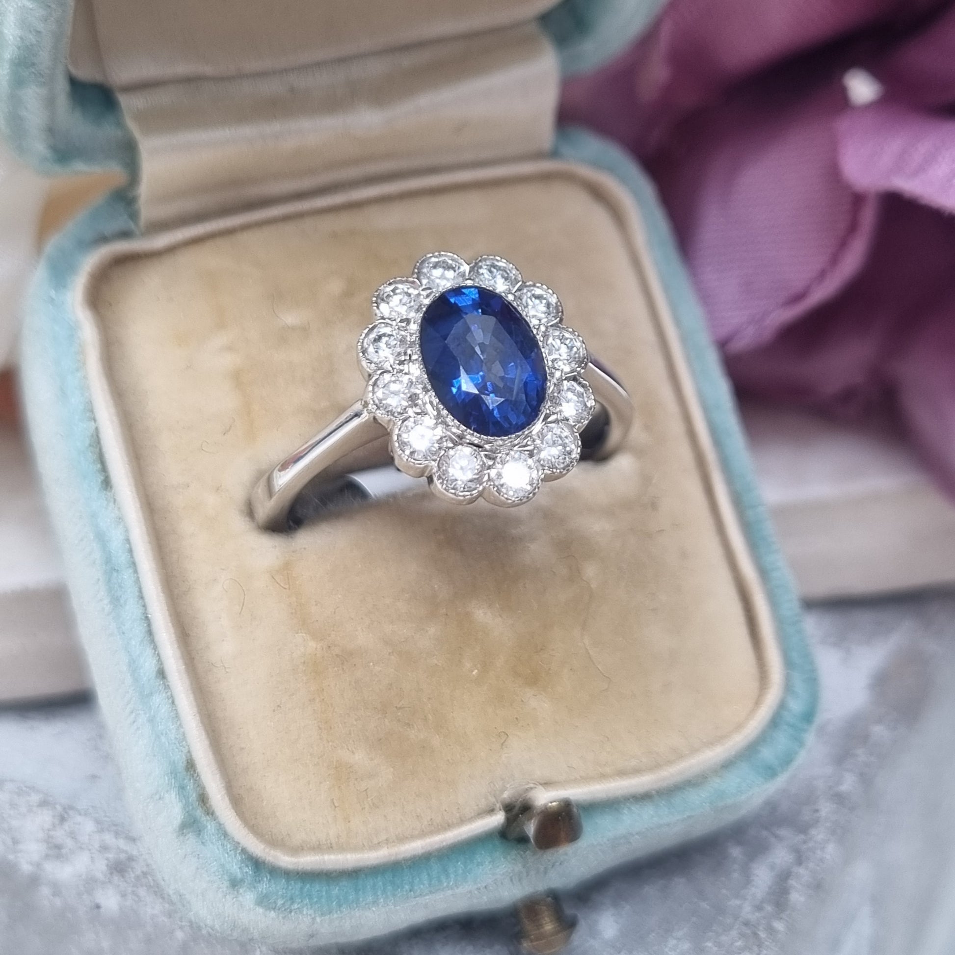 1.33ct Oval Sapphire and Diamond Cluster Engagement Ring