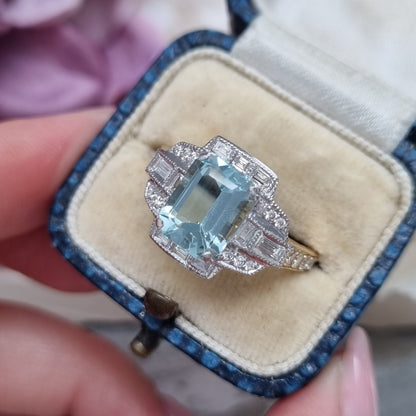 2.34ct Emerald Cut Aquamarine and Diamond Cluster Engagement Ring in 18ct White and Yellow Gold