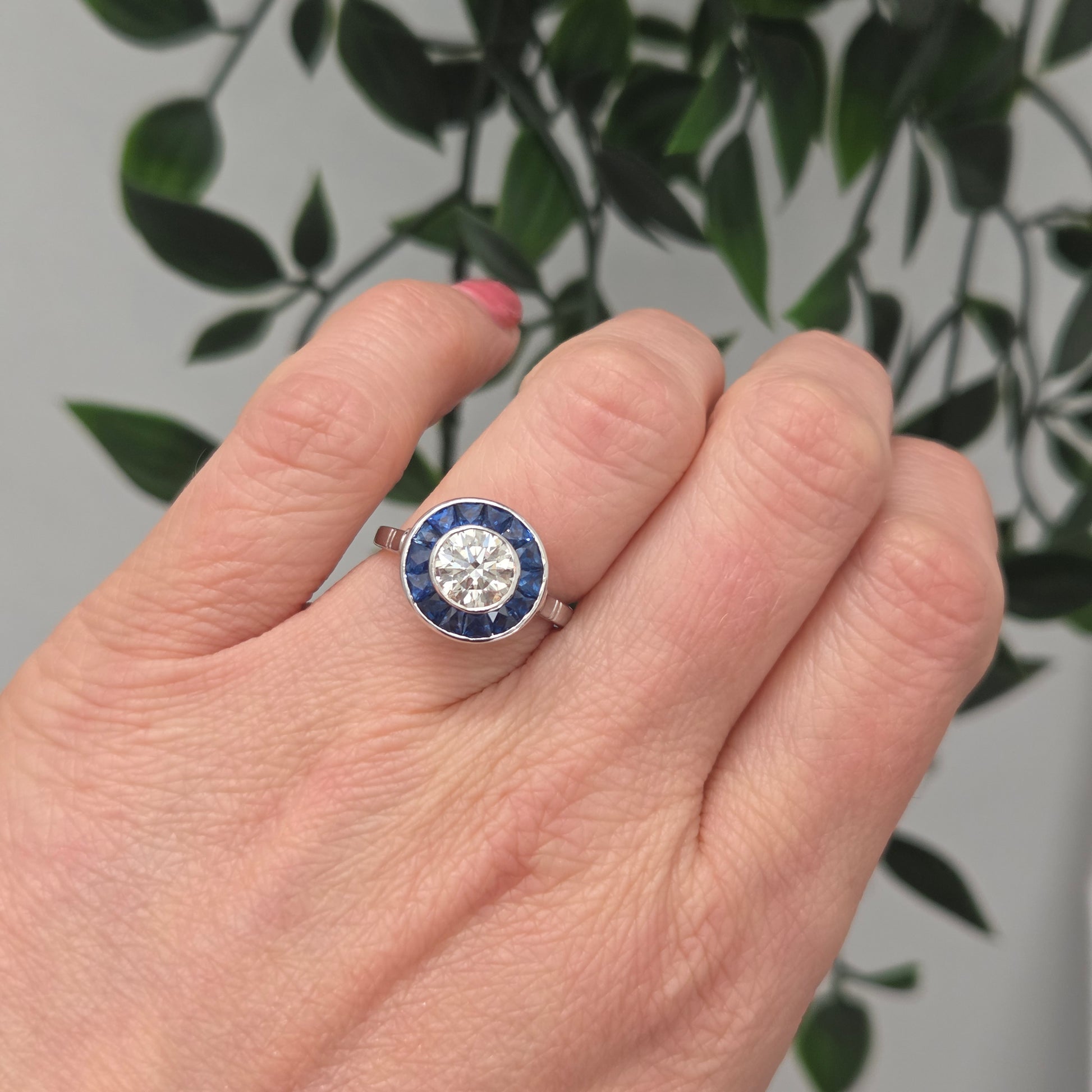 1.21ct Diamond and Calibre Sapphire Target Engagement Ring