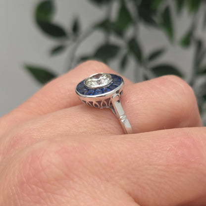 1.21ct Diamond and Calibre Sapphire Target Engagement Ring