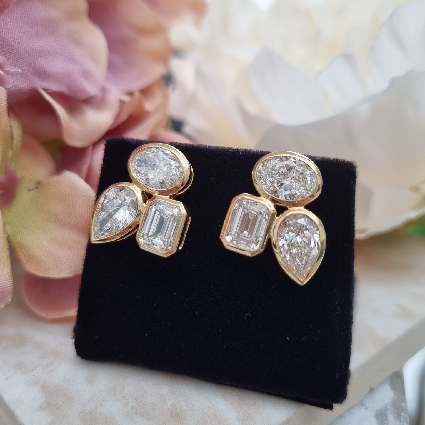 Stylish Pear Oval and Emerald Cut Diamond Earrings