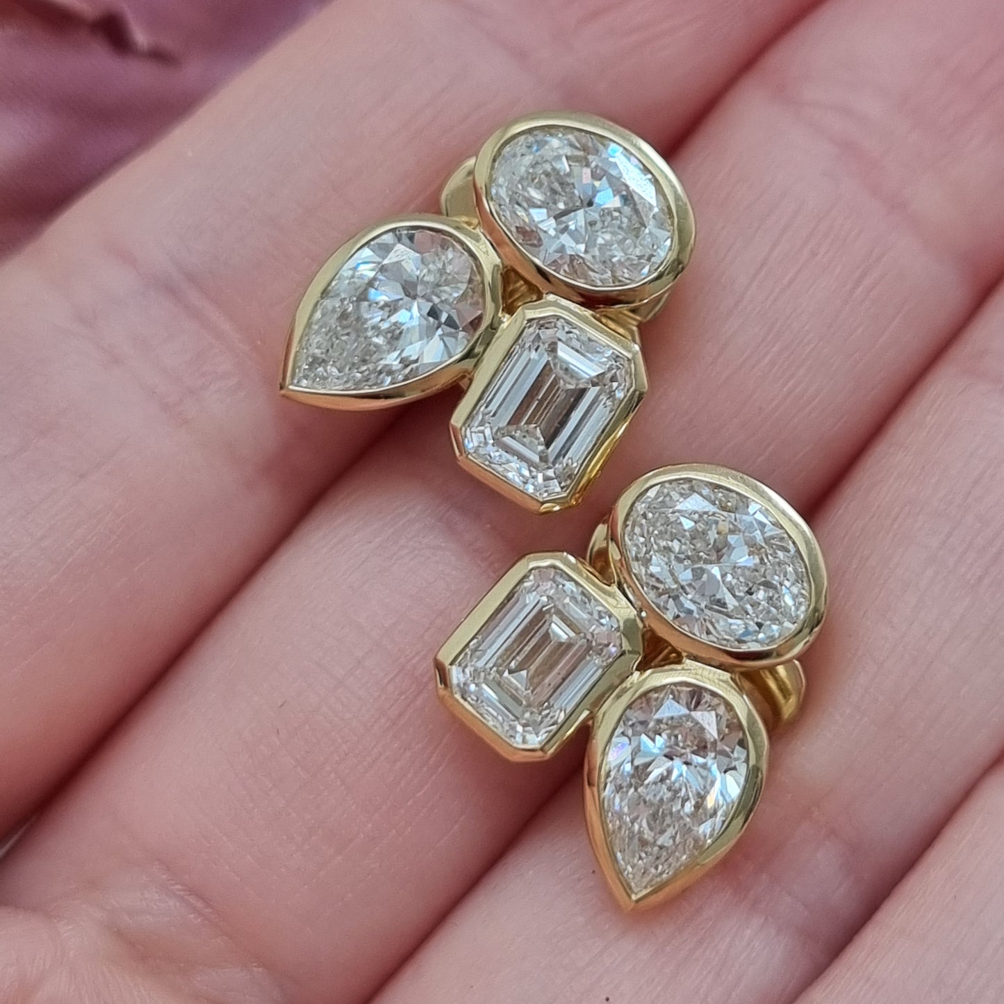 Stylish Pear Oval and Emerald Cut Diamond Earrings
