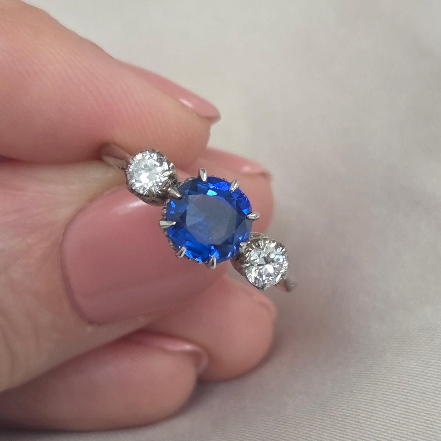Vintage Late Art Deco 1.25ct Vivid Blue Sapphire and Diamond Three Stone Engagement Ring