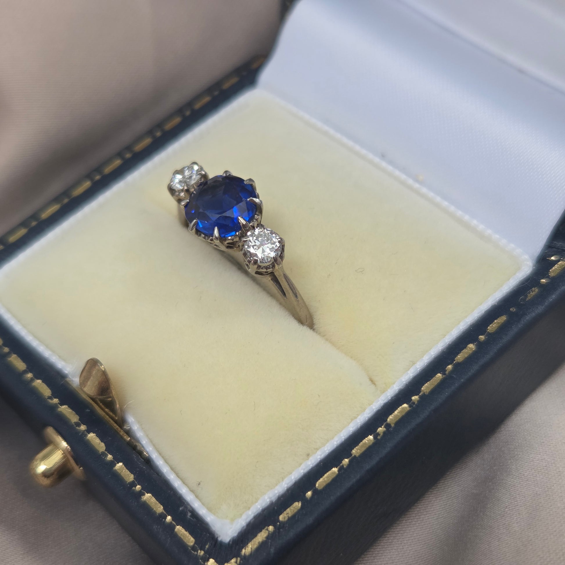 Vintage Late Art Deco 1.25ct Vivid Blue Sapphire and Diamond Three Stone Engagement Ring