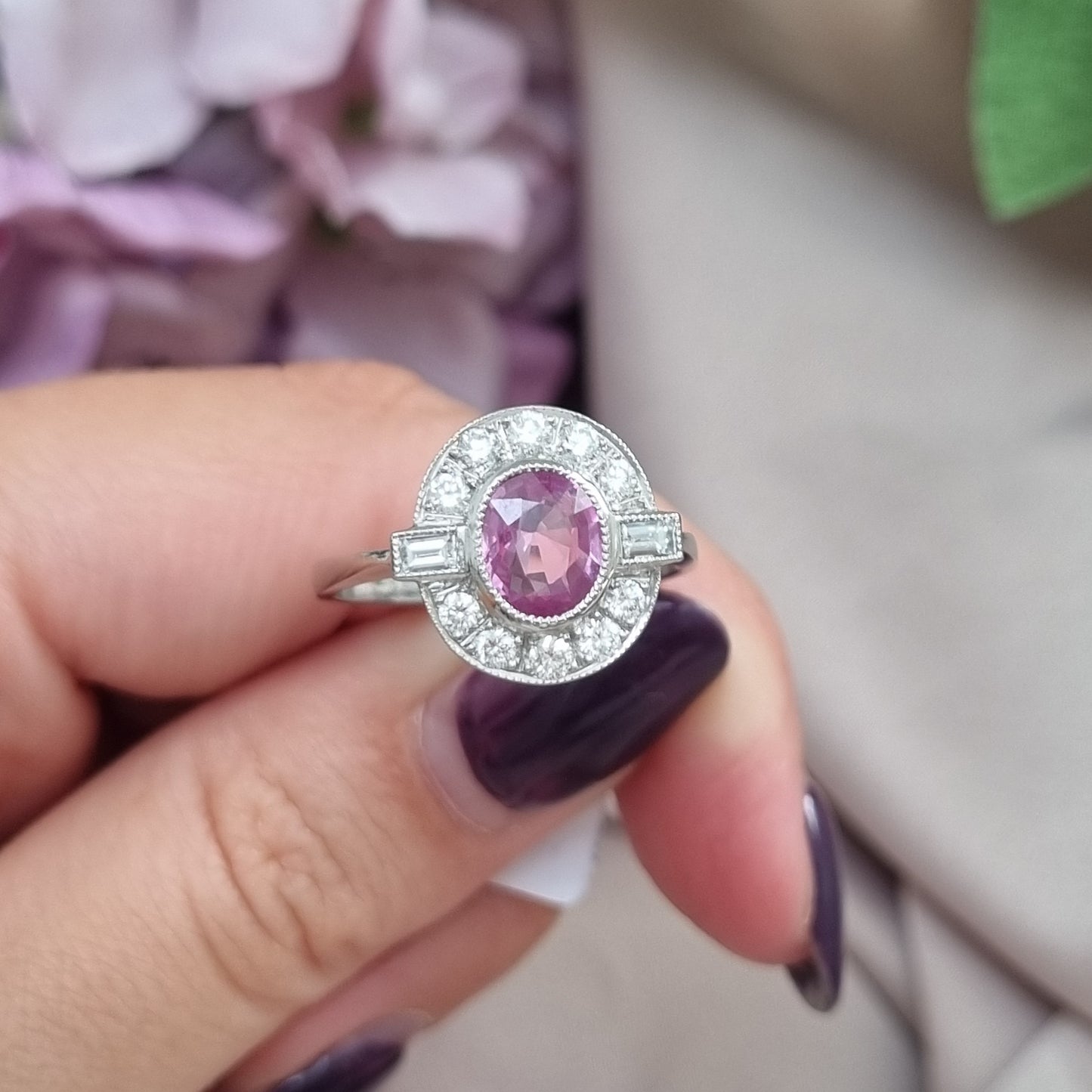 1.20ct oval pink sapphire ring with diamonds in platinum