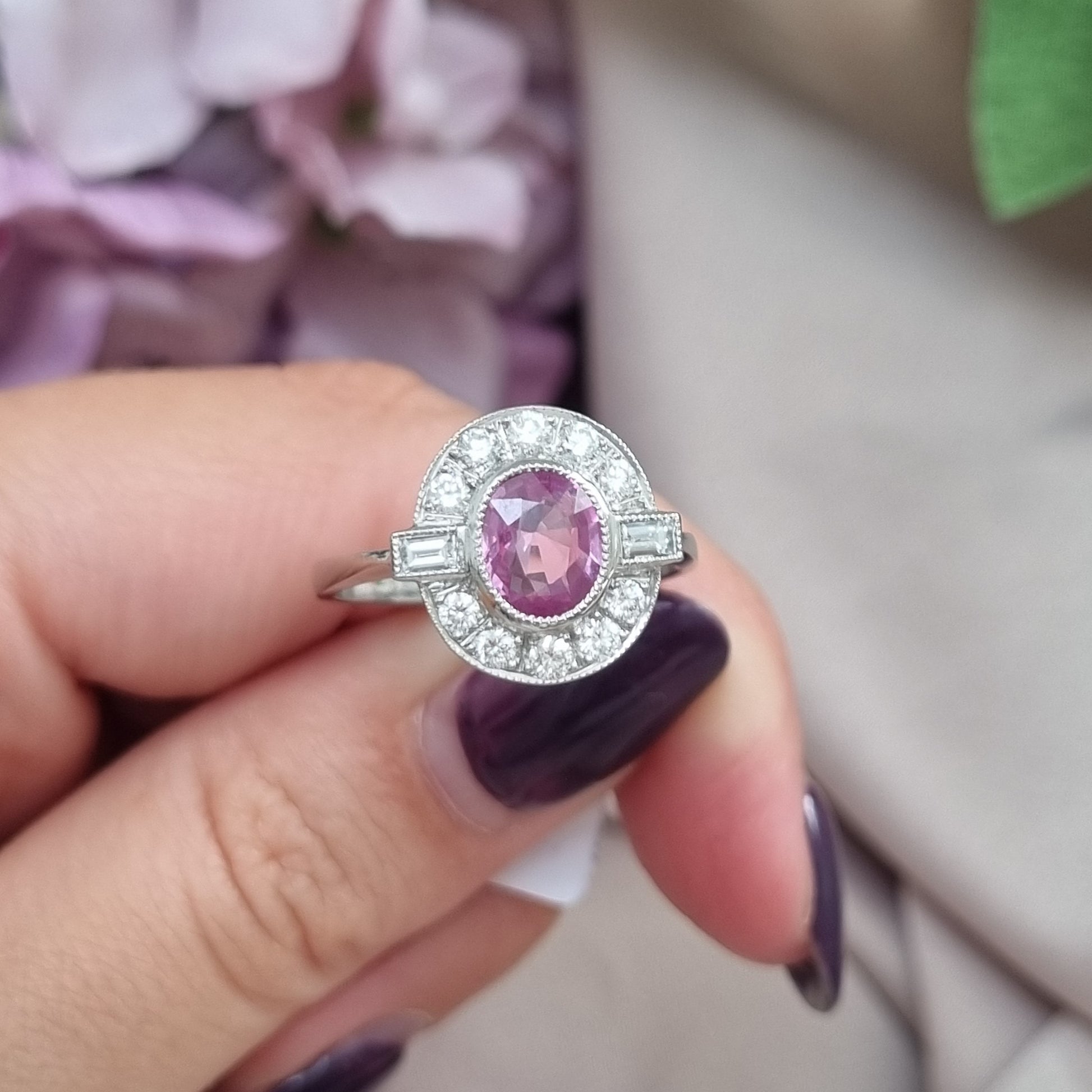 1.20ct oval pink sapphire ring with diamonds in platinum