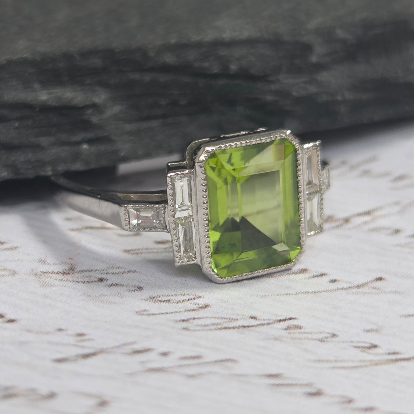 2.60ct Emerald Cut Peridot Ring with Baguette Diamonds in Platinum