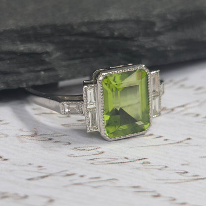 2.60ct Emerald Cut Peridot Ring with Baguette Diamonds in Platinum