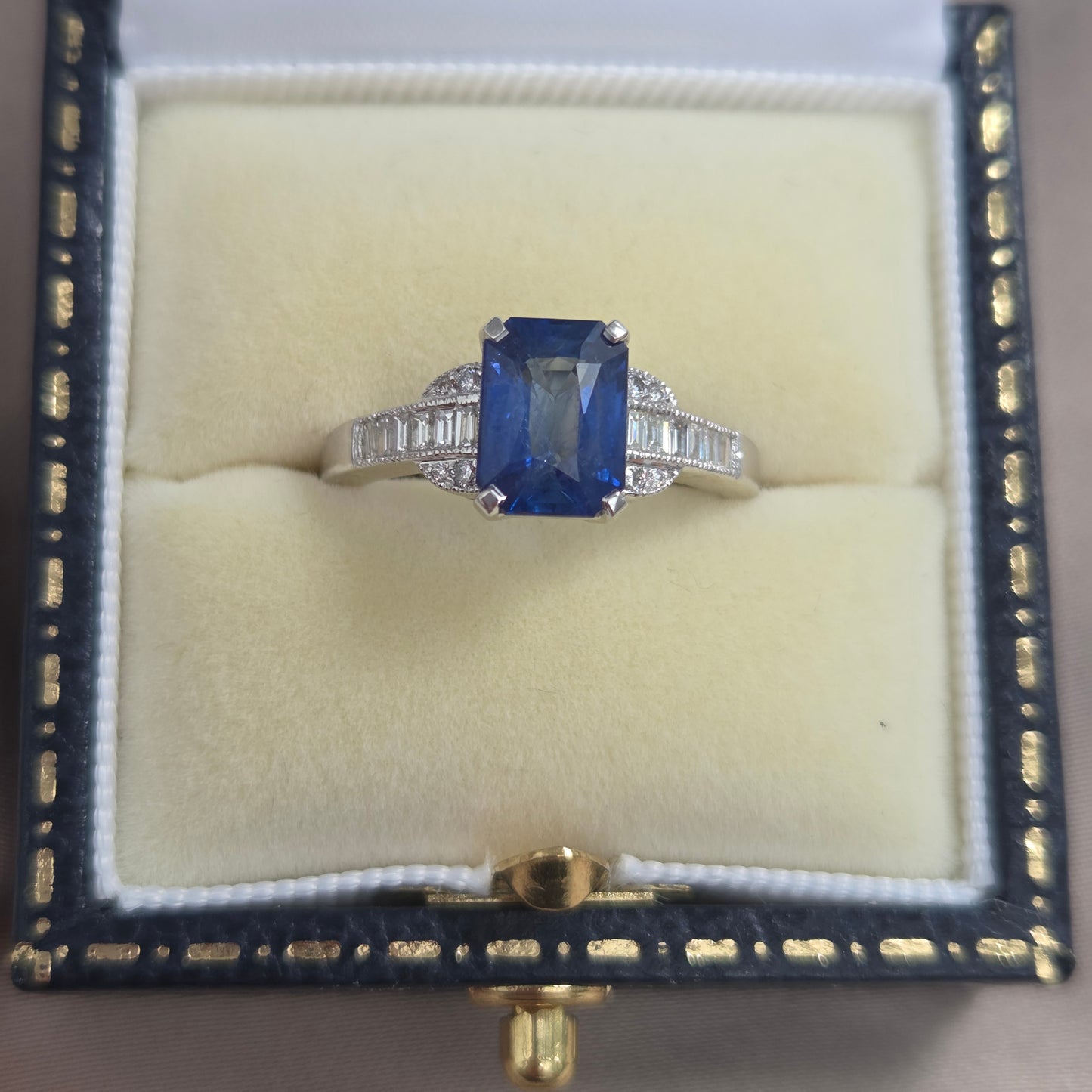 2.18ct Emerald Cut Sapphire and Baguette Diamond Engagement Ring