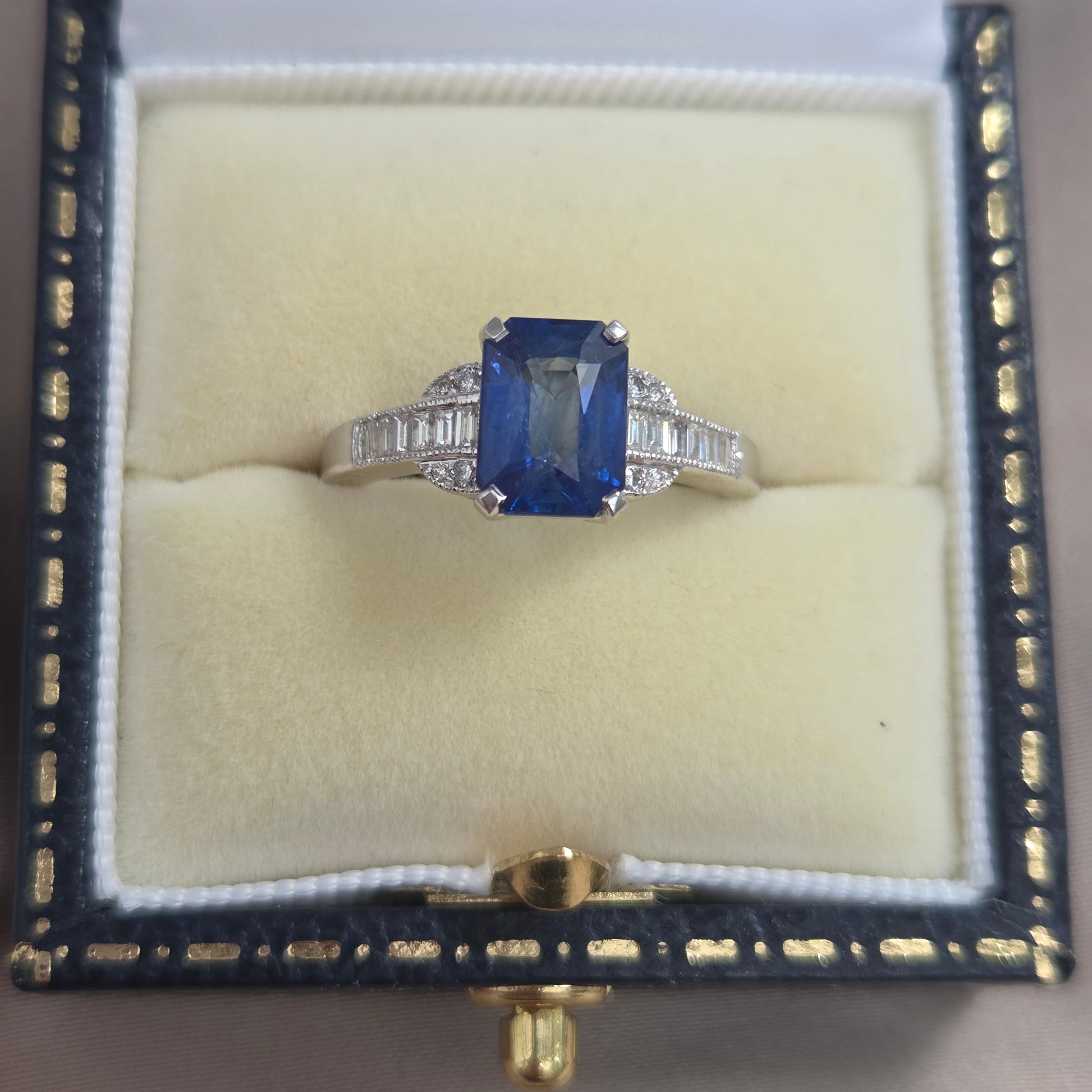 2.18ct Emerald Cut Sapphire and Baguette Diamond Engagement Ring