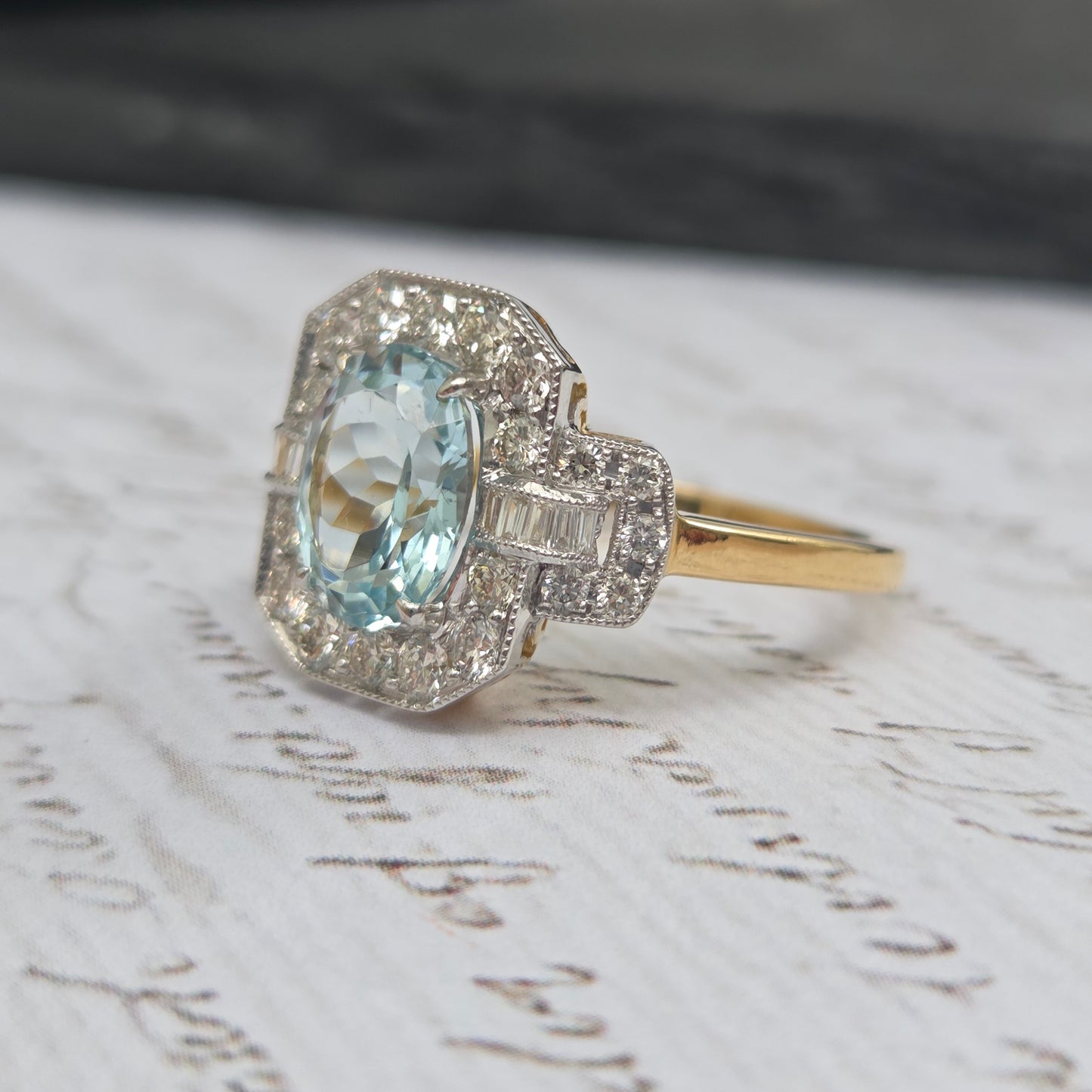 1.64ct Oval Aquamarine and Diamond Cluster Dress Ring with Buckle Shoulders