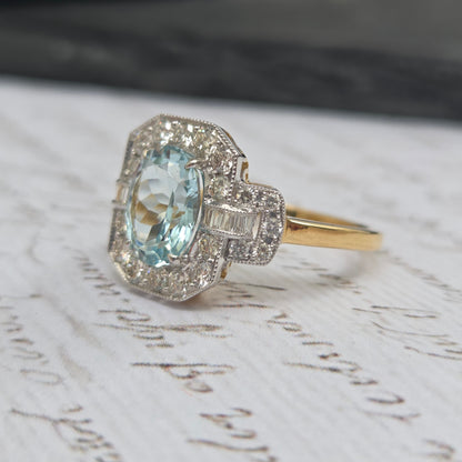 1.64ct Oval Aquamarine and Diamond Cluster Dress Ring with Buckle Shoulders