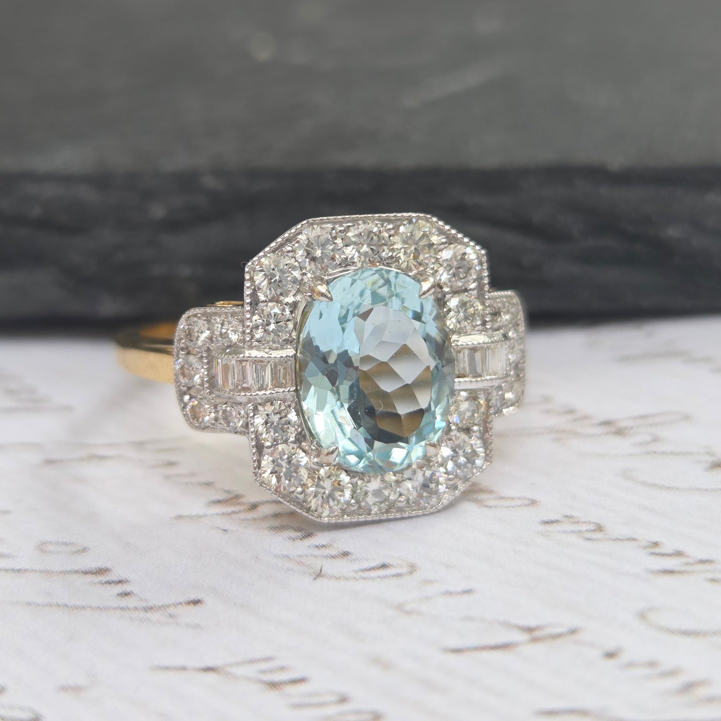 1.64ct Oval Aquamarine and Diamond Cluster Dress Ring with Buckle Shoulders