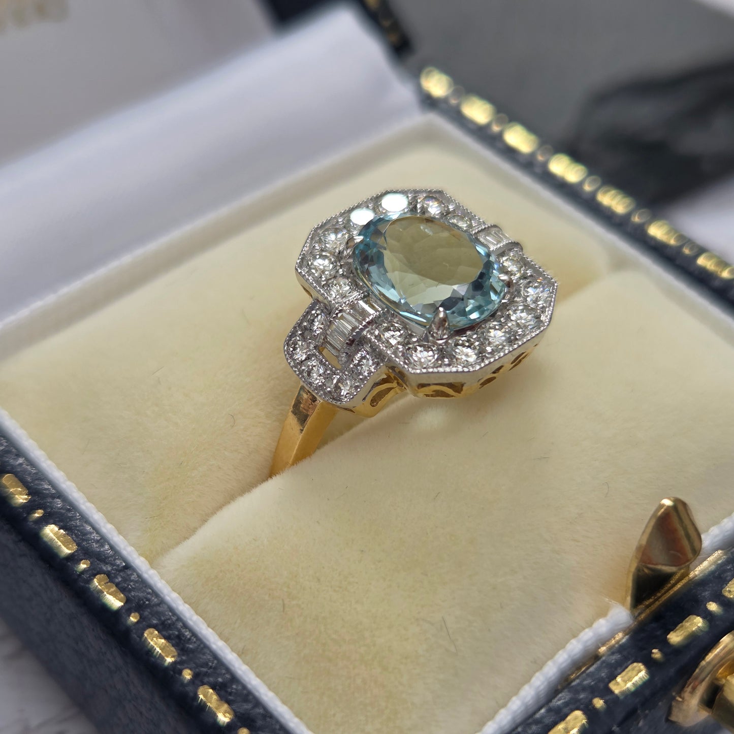 1.64ct Oval Aquamarine and Diamond Cluster Dress Ring with Buckle Shoulders