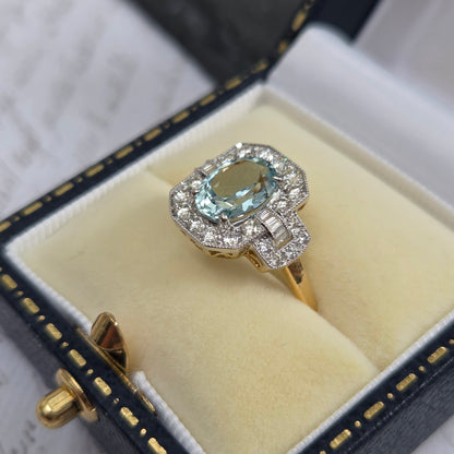 1.64ct Oval Aquamarine and Diamond Cluster Dress Ring with Buckle Shoulders