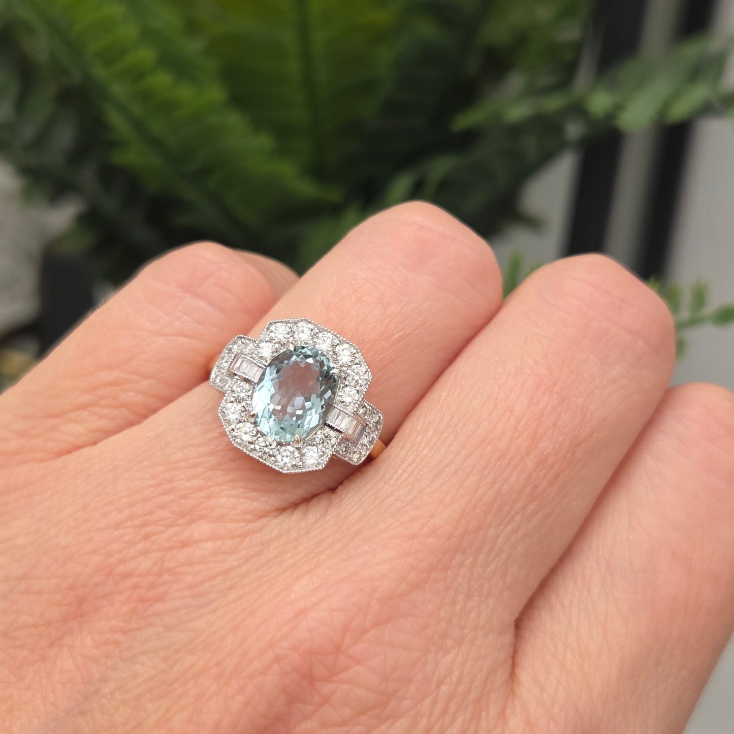 1.64ct Oval Aquamarine and Diamond Cluster Dress Ring with Buckle Shoulders