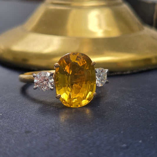 Oval Yellow Sapphire and Diamond Three Stone Engagement Ring in Platinum and 18ct Yellow Gold