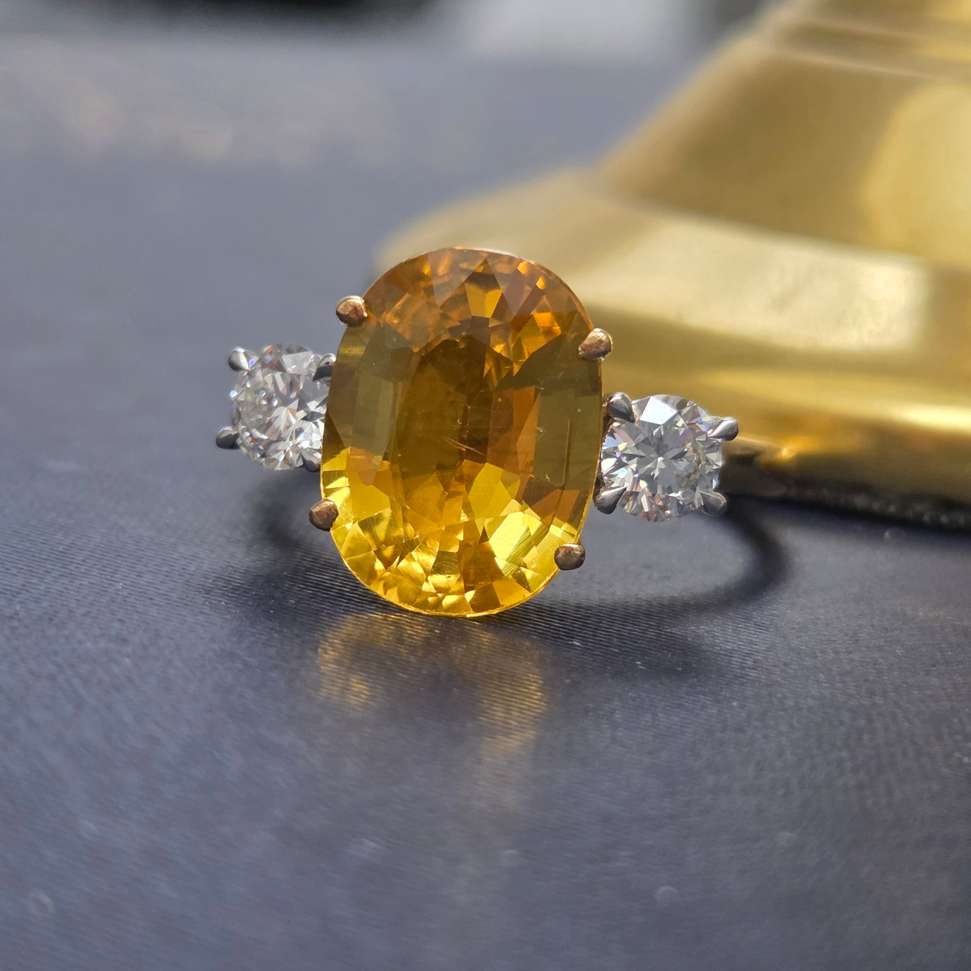 Oval Yellow Sapphire and Diamond Three Stone Engagement Ring in Platinum and 18ct Yellow Gold