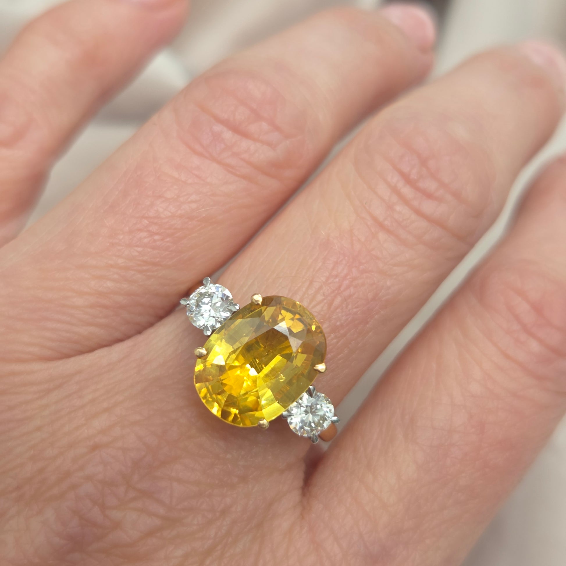 Oval Yellow Sapphire and Diamond Three Stone Engagement Ring in Platinum and 18ct Yellow Gold
