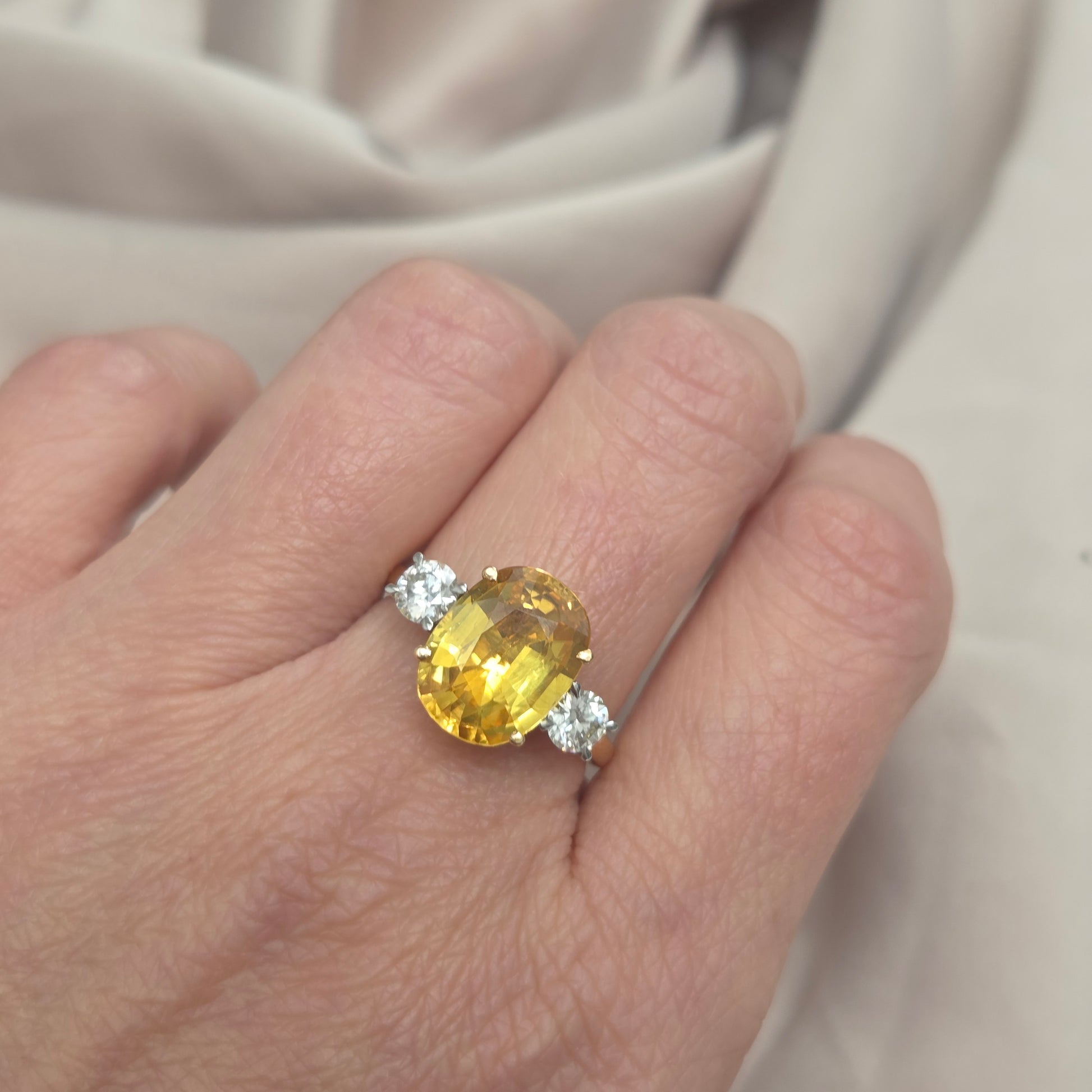 Oval Yellow Sapphire and Diamond Three Stone Engagement Ring in Platinum and 18ct Yellow Gold