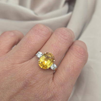 Oval Yellow Sapphire and Diamond Three Stone Engagement Ring in Platinum and 18ct Yellow Gold