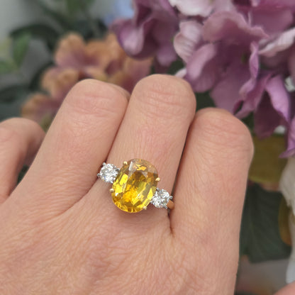 Oval Yellow Sapphire and Diamond Three Stone Engagement Ring in Platinum and 18ct Yellow Gold
