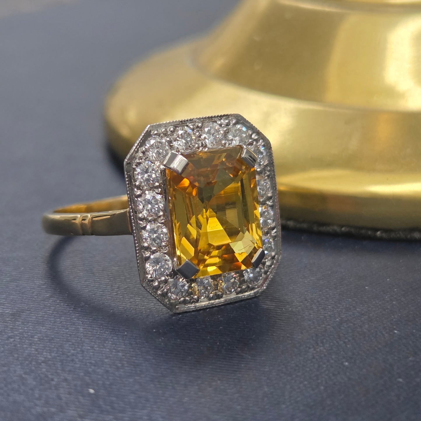 4.25ct Emerald Cut Yellow Sapphire and Diamond Cluster Engagement Ring in Platinum to 18ct Yellow Gold