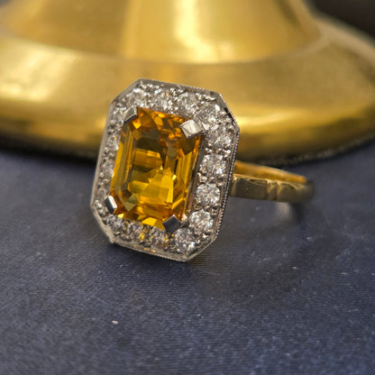 4.25ct Emerald Cut Yellow Sapphire and Diamond Cluster Engagement Ring in Platinum to 18ct Yellow Gold