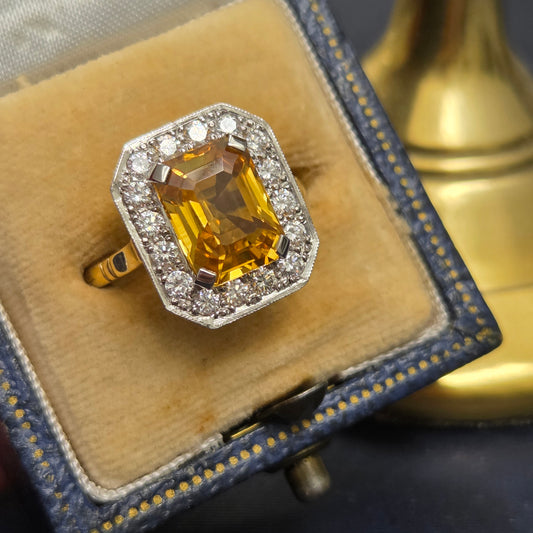 4.25ct Emerald Cut Yellow Sapphire and Diamond Cluster Engagement Ring