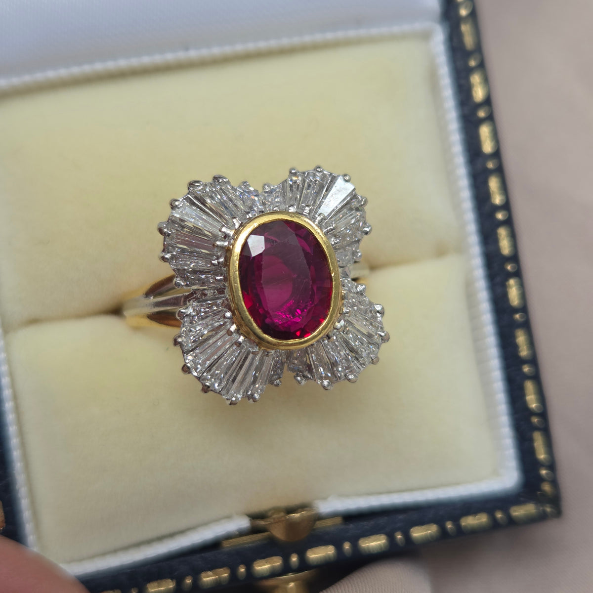 Oval Ruby and Tapered Baguette Diamond Ballerina Cluster Ring