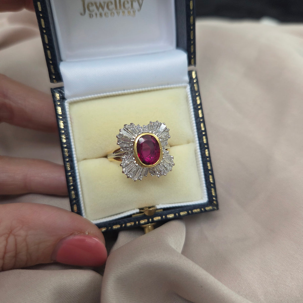 Oval Ruby and Tapered Baguette Diamond Ballerina Cluster Ring