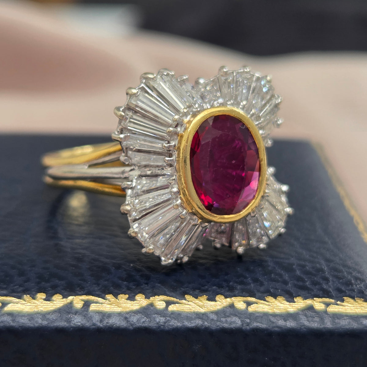 Oval Ruby and Tapered Baguette Diamond Ballerina Cluster Ring