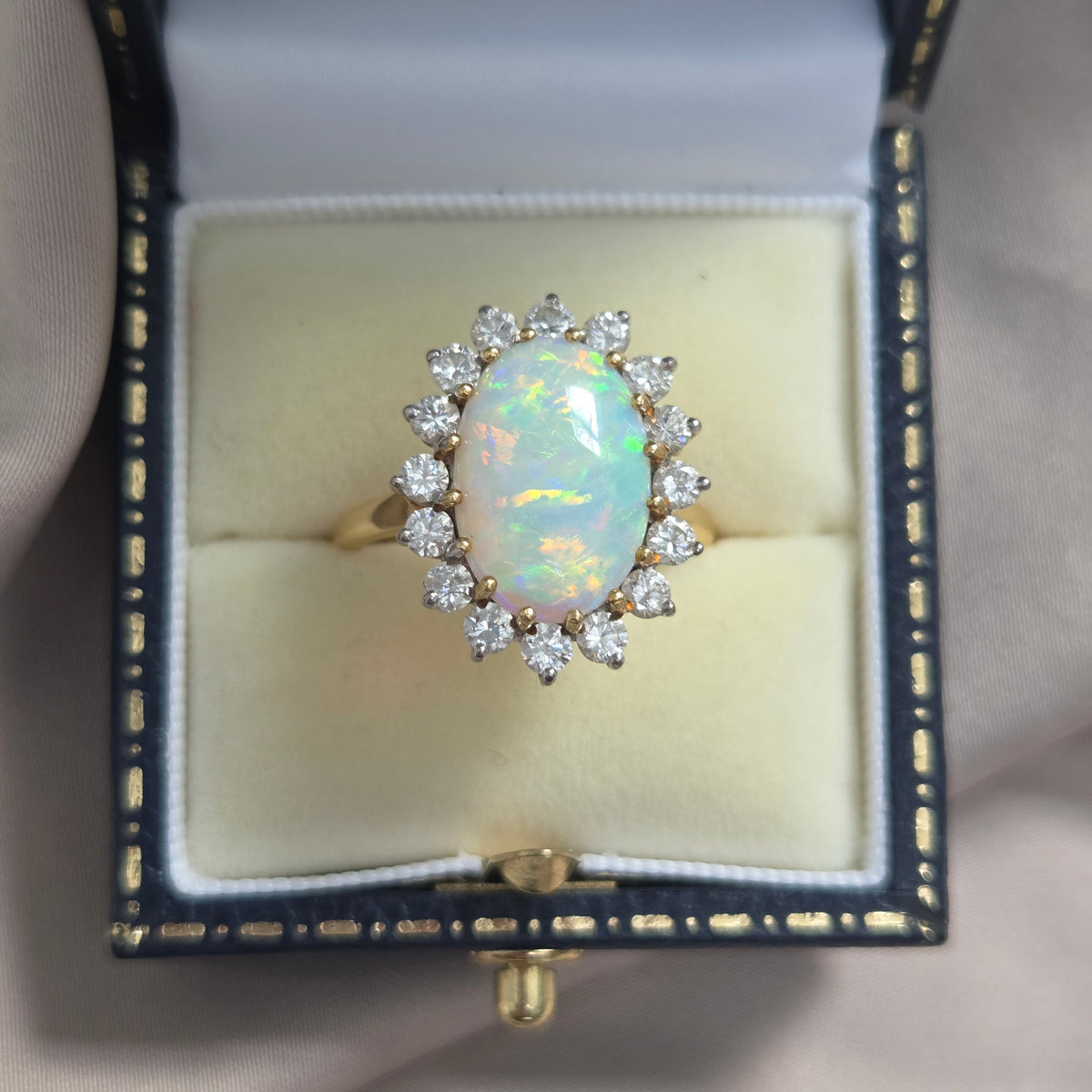 Vintage Oval Cabochon Opal and Diamond Cluster Ring in Yellow Gold Circa 1960