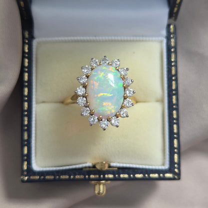 Vintage Oval Cabochon Opal and Diamond Cluster Ring in Yellow Gold Circa 1960