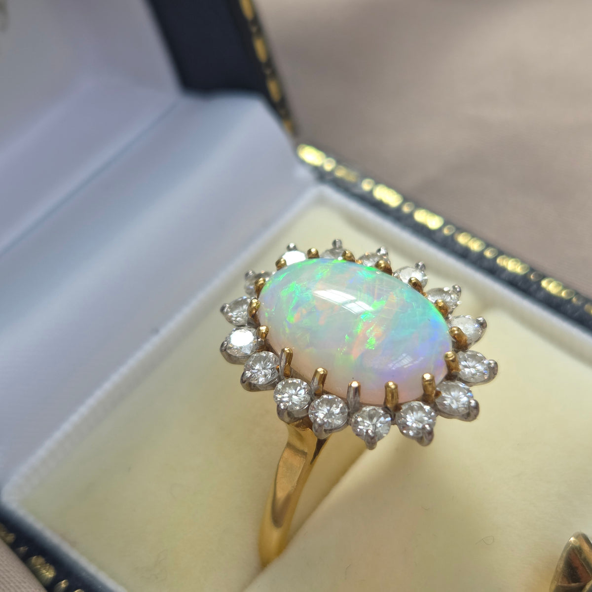 Vintage Oval Cabochon Opal and Diamond Cluster Ring in Yellow Gold Circa 1960