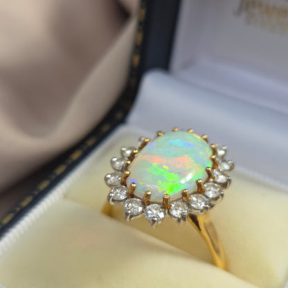 Vintage Oval Cabochon Opal and Diamond Cluster Ring in Yellow Gold Circa 1960