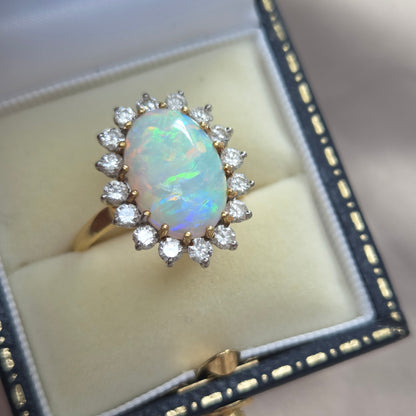 Vintage Oval Cabochon Opal and Diamond Cluster Ring in Yellow Gold Circa 1960