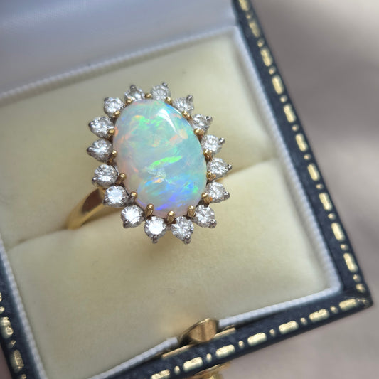 Vintage Oval Cabochon Opal and Diamond Cluster Ring in Yellow Gold Circa 1960