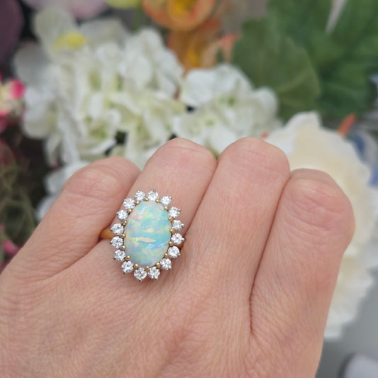Vintage Oval Cabochon Opal and Diamond Cluster Ring in Yellow Gold Circa 1960