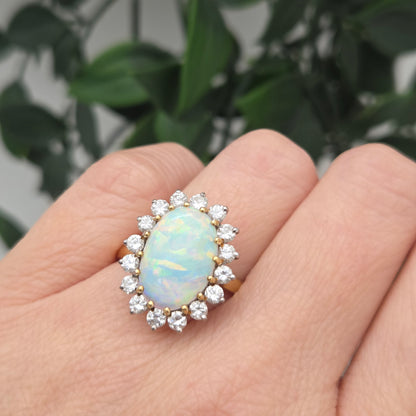 Vintage Oval Cabochon Opal and Diamond Cluster Ring in Yellow Gold Circa 1960